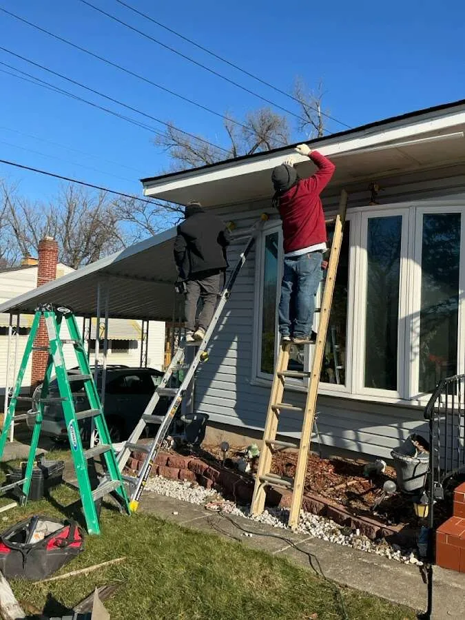 Restoration crew performing exterior repair in New Providence